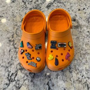 Orange crocs with Jibbitz